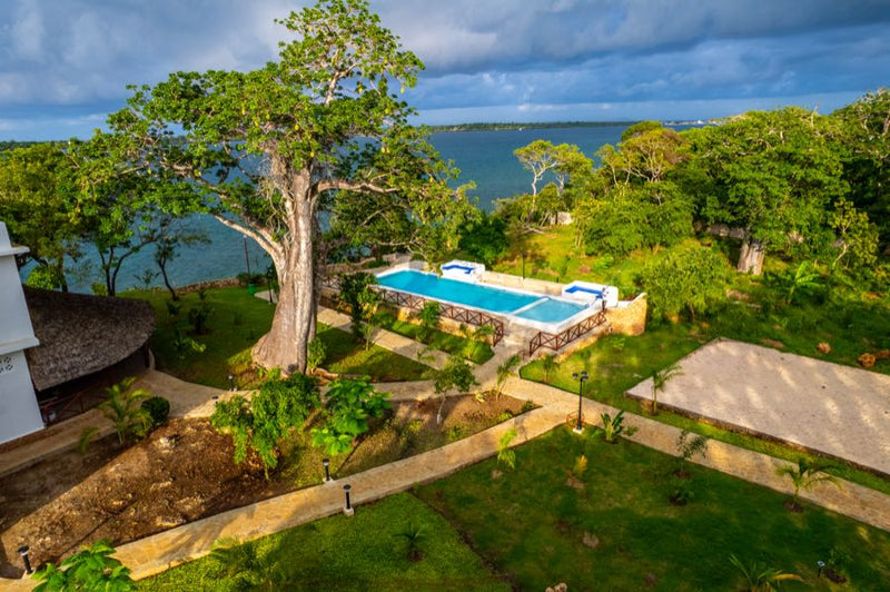 Aerial view of Kasa Pomboo's clifftop pool and baobab tree